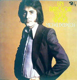 UN PARIS-SOIR SUR LE VISAGE MICHEL DELPECH